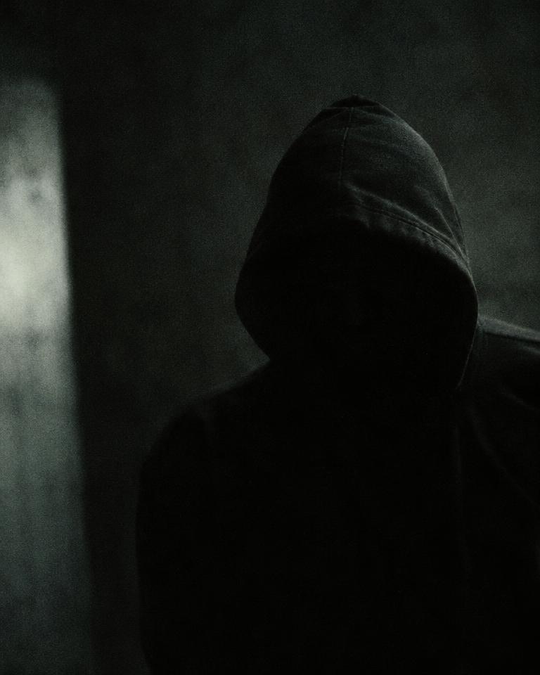 Blurred silhouette of an upcoming hoodie